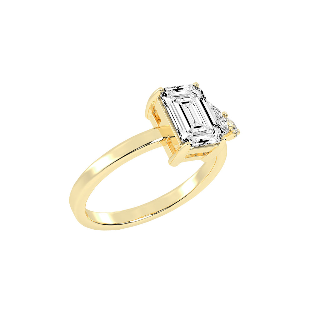Triadaura emerald cut three stone lab diamond ring