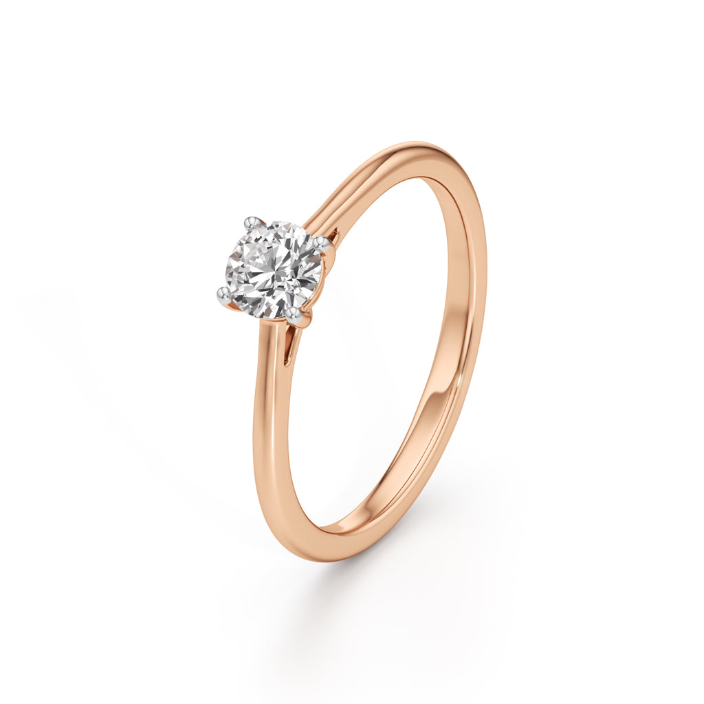 Solienara four prong round cut solitaire ring