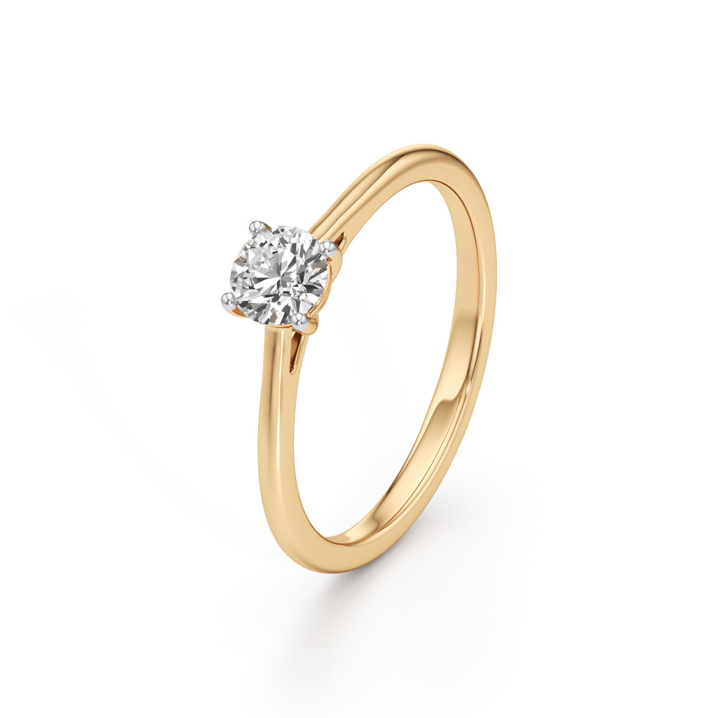 Solienara four prong round cut solitaire ring