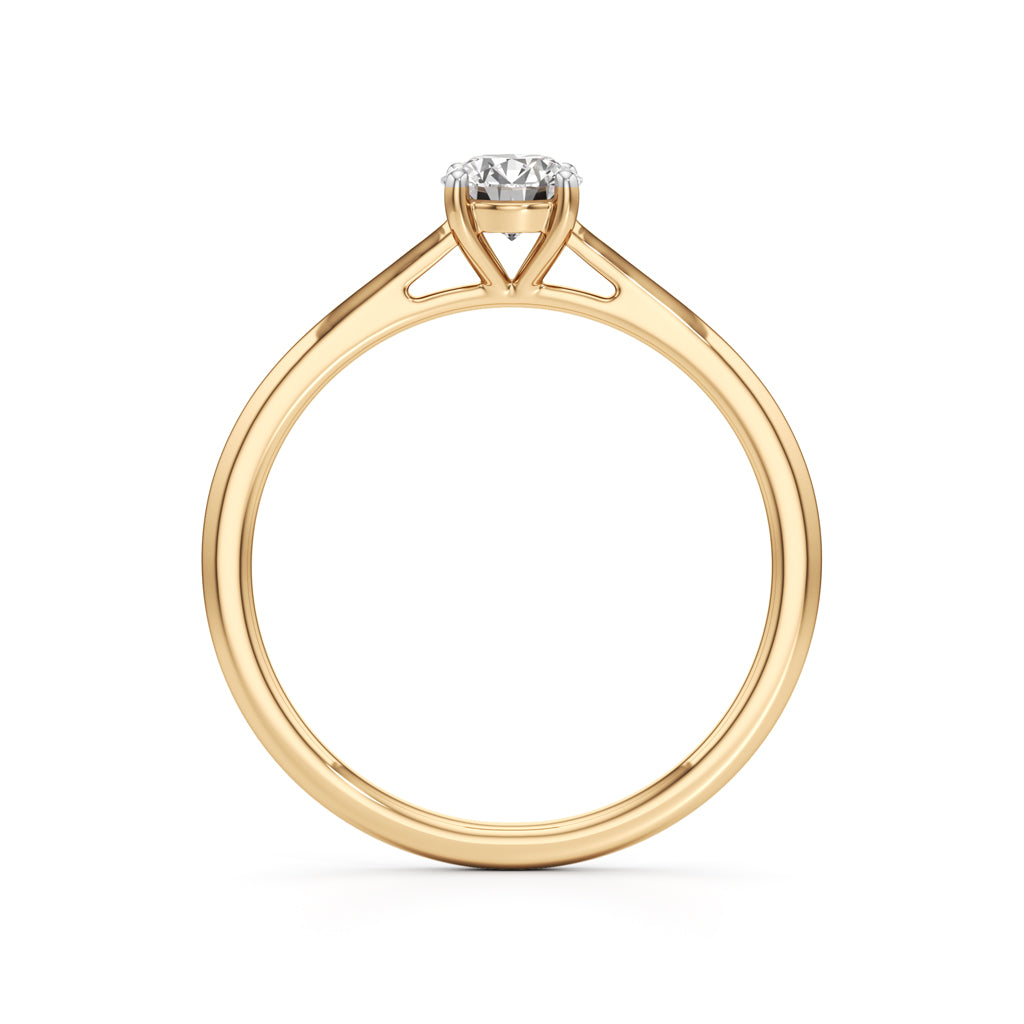 Solienara four prong round cut solitaire ring