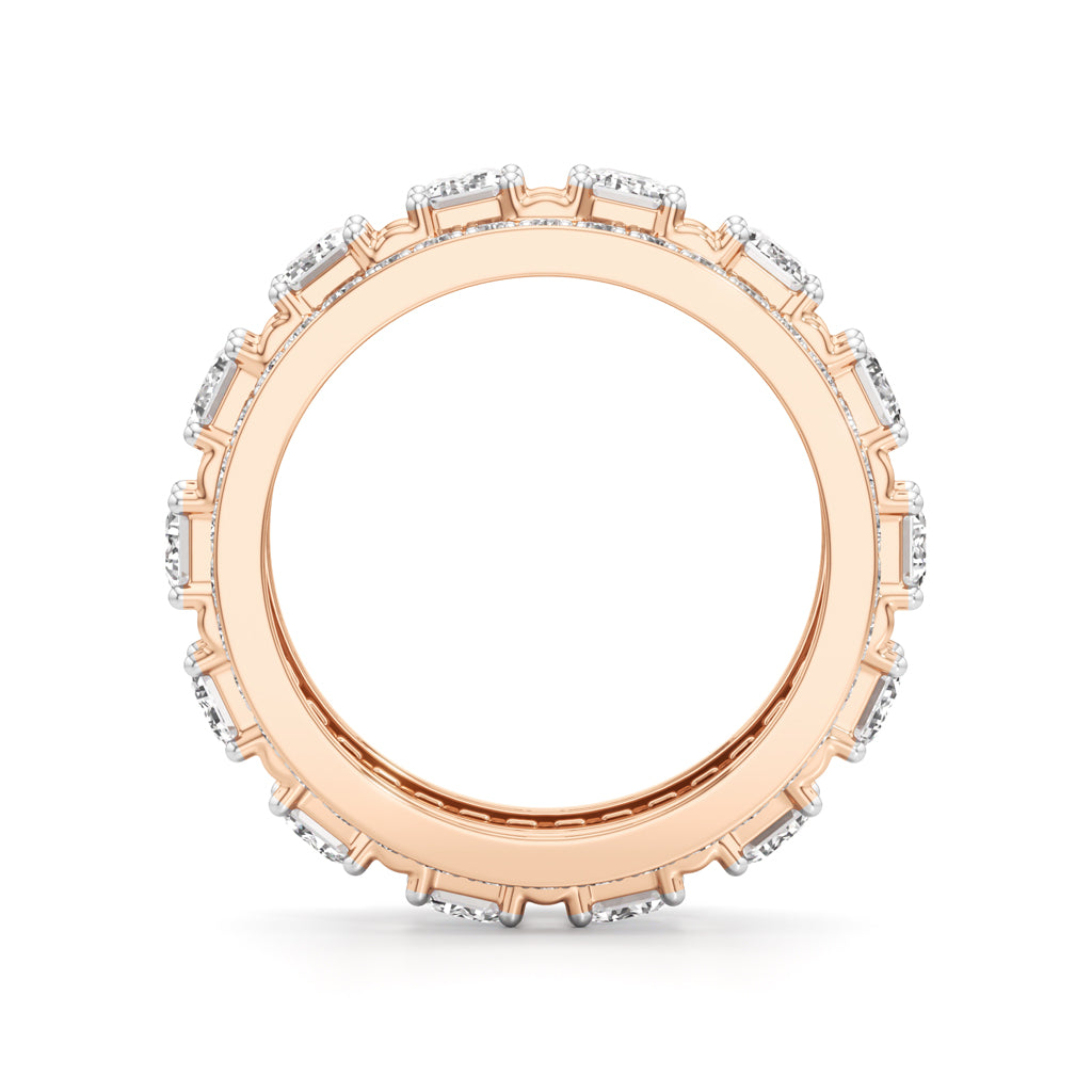 The Radiant Majesty Baguette Diamond Eternity Band with Pave Halo Accents