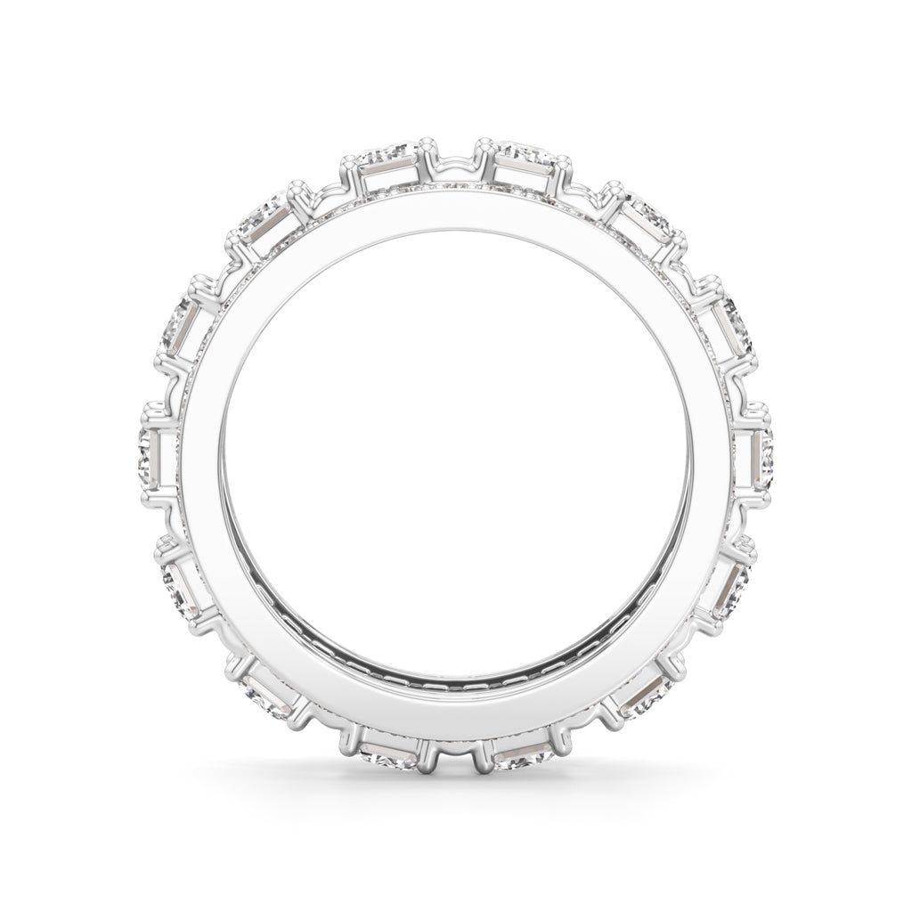 The Radiant Majesty Baguette Diamond Eternity Band with Pave Halo Accents