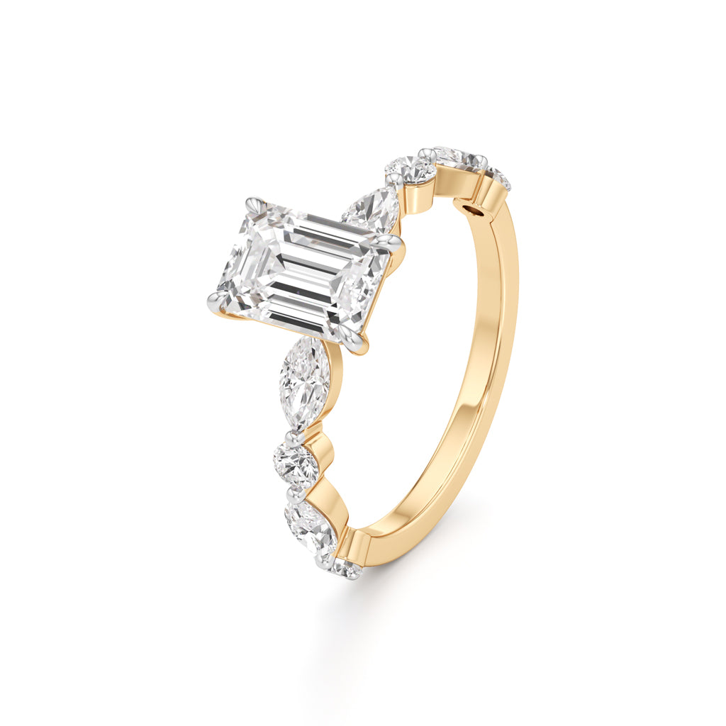 Emerald Cut & Pear Side Stone Ring