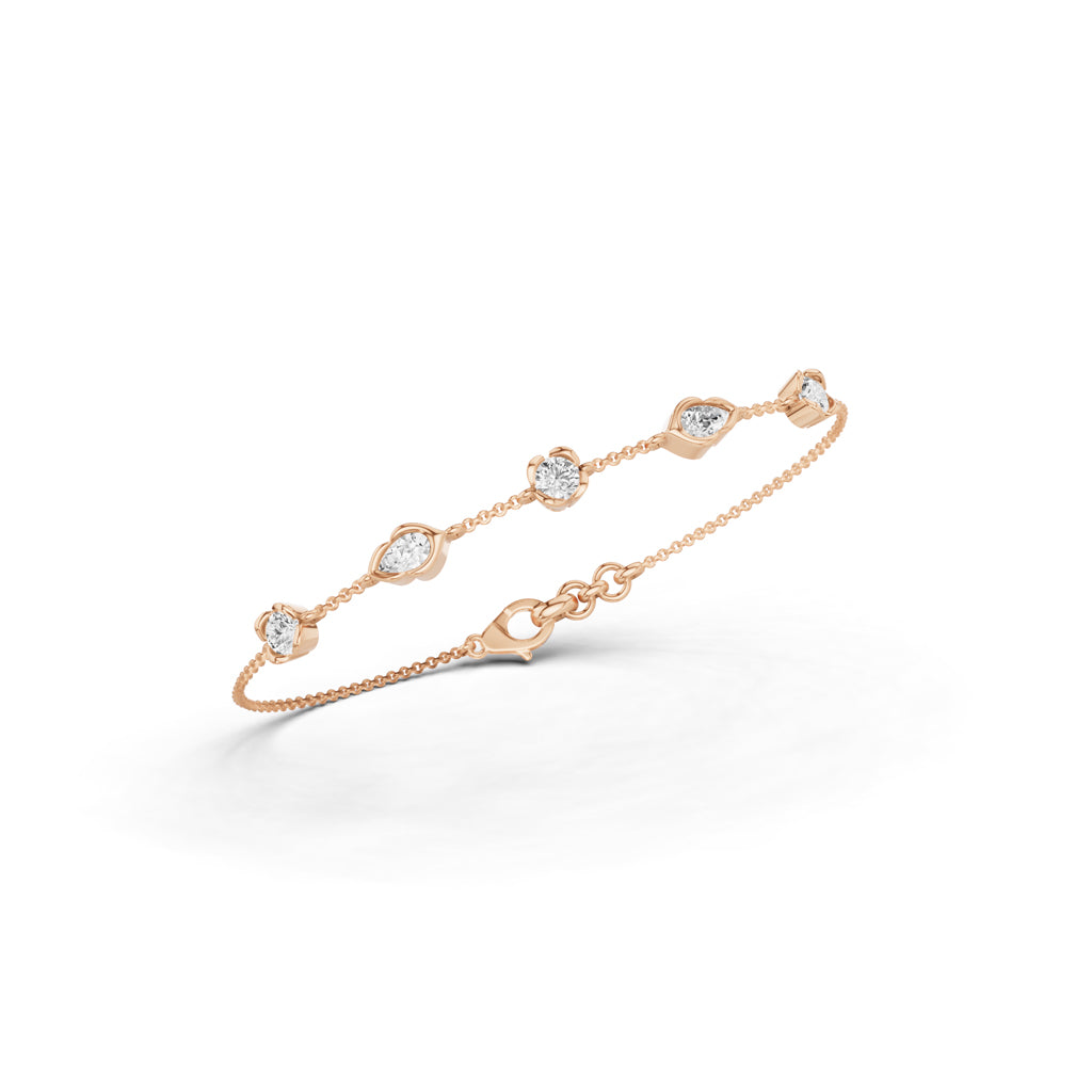 Luxury MultiShape Pear and Round Cut Diamond Station Chain Bracelet  Elegant Yellow Gold Bezel Signature Jewelry