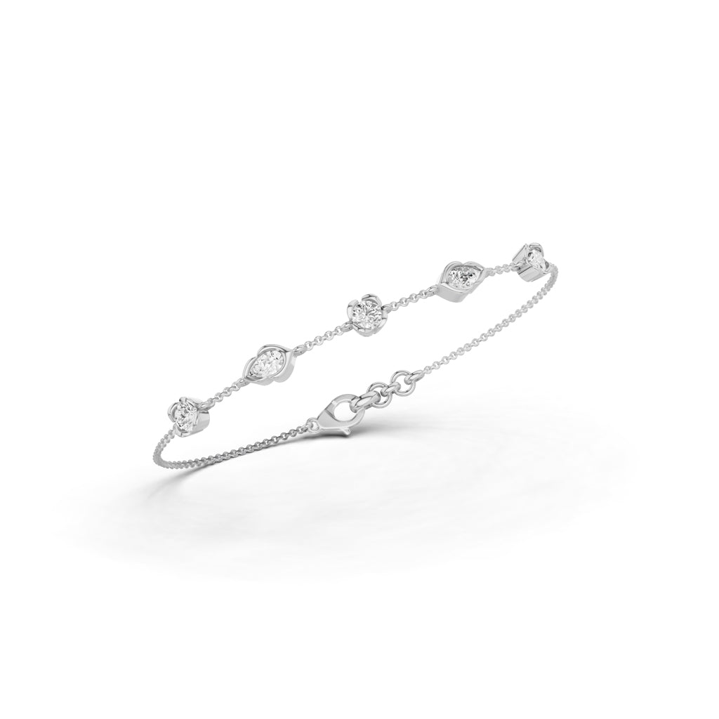 Luxury MultiShape Pear and Round Cut Diamond Station Chain Bracelet  Elegant Yellow Gold Bezel Signature Jewelry