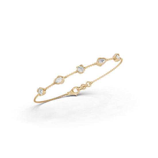 Luxury MultiShape Pear and Round Cut Diamond Station Chain Bracelet  Elegant Yellow Gold Bezel Signature Jewelry