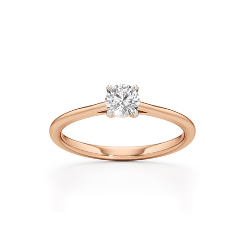 Solienara four prong round cut solitaire ring