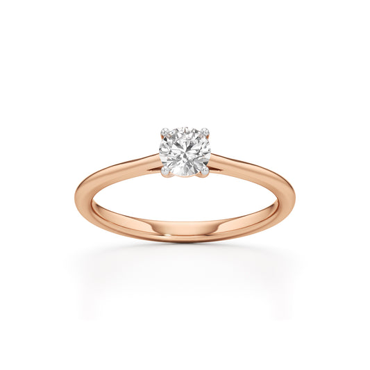 Solienara four prong round cut solitaire ring
