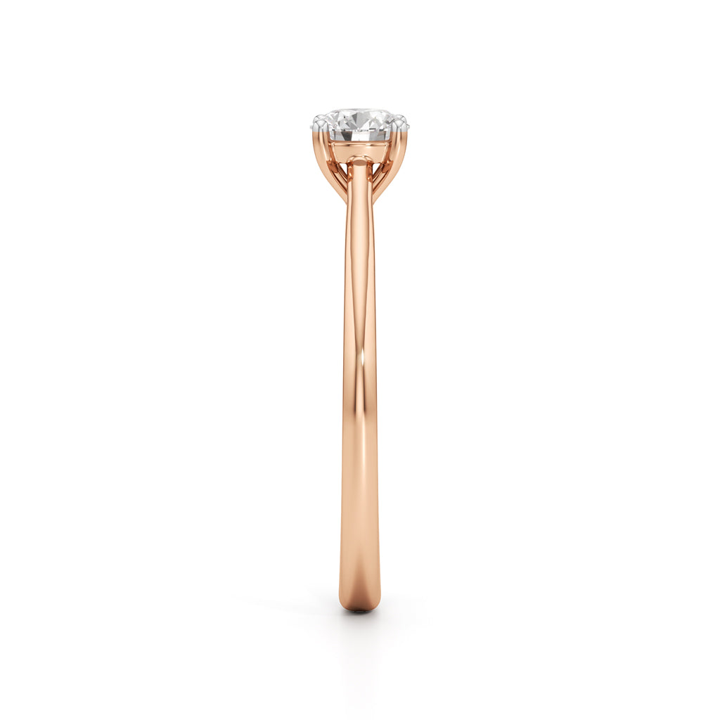 Solienara four prong round cut solitaire ring