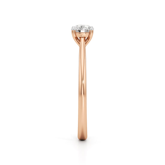 Solienara four prong round cut solitaire ring