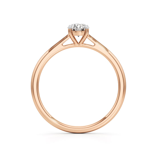 Solienara four prong round cut solitaire ring