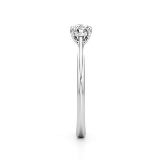Solienara four prong round cut solitaire ring