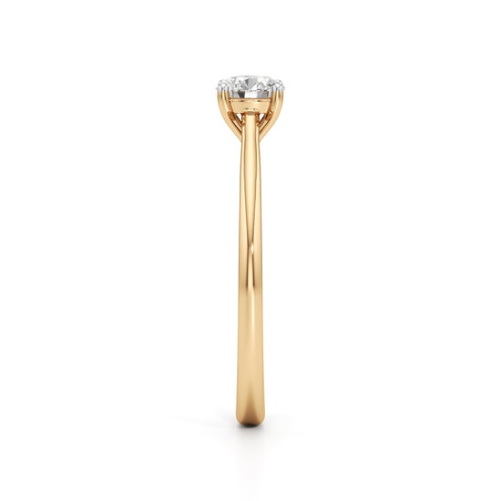 Solienara four prong round cut solitaire ring