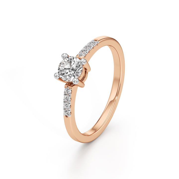 Vistara shared prong round cut side stone ring