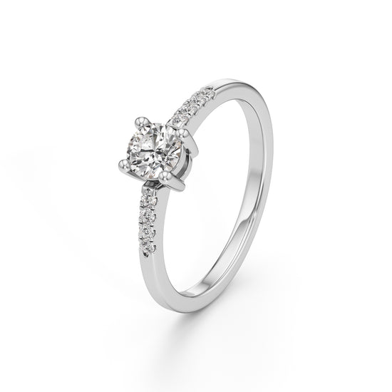 Vistara shared prong round cut side stone ring