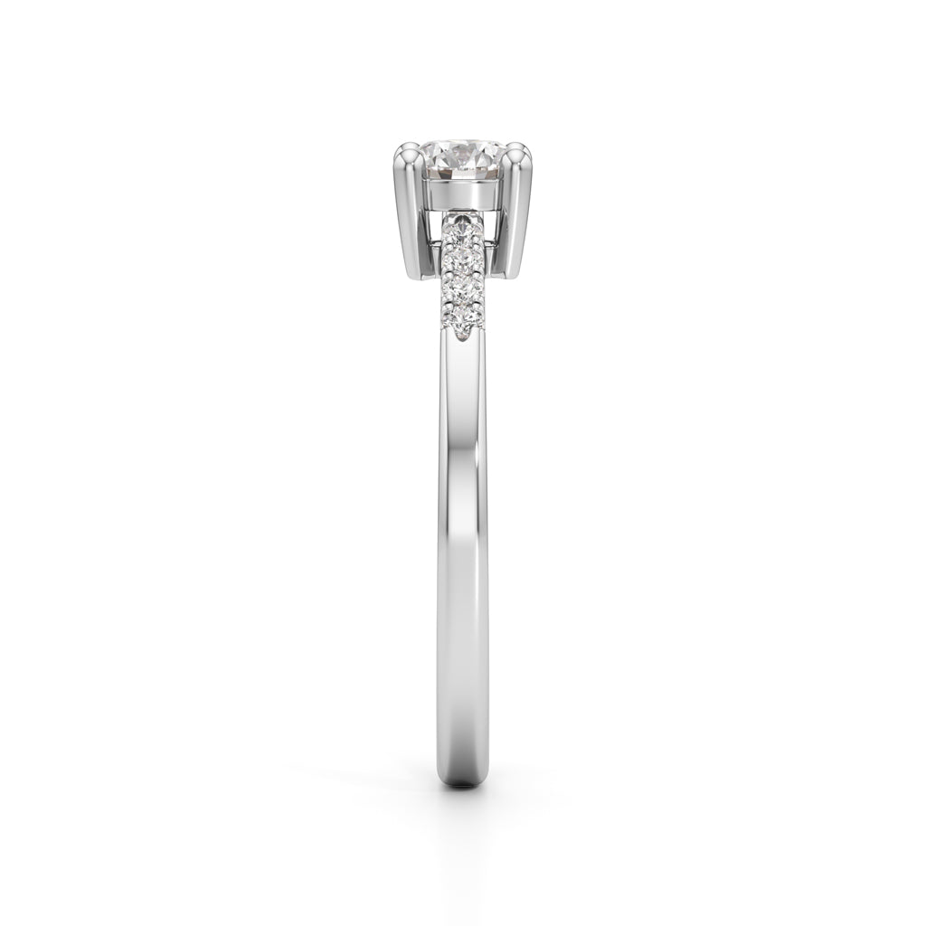 Vistara shared prong round cut side stone ring