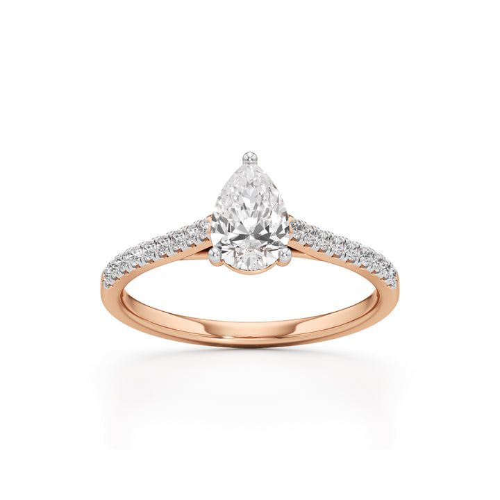 Teardrop Grace – 0.71 Ct Pear Shape Side Stone Ring