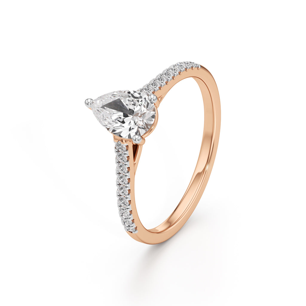 Teardrop Grace  071 Ct Pear Shape Side Stone Ring