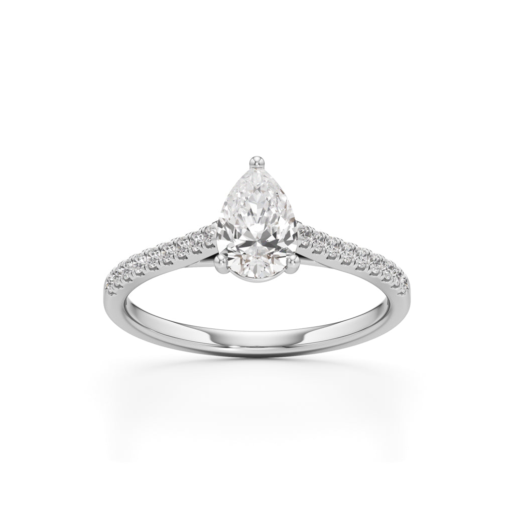Teardrop Grace – 0.71 Ct Pear Shape Side Stone Ring