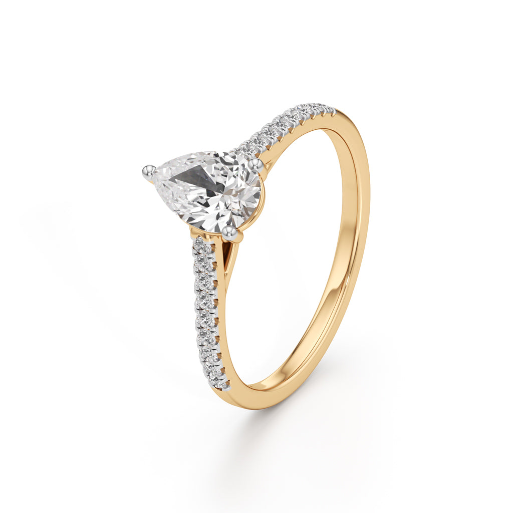 Teardrop Grace  071 Ct Pear Shape Side Stone Ring