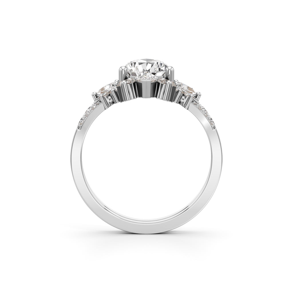 Crowned Radiance Pear-Cut Diamond Ring with Regal Accents