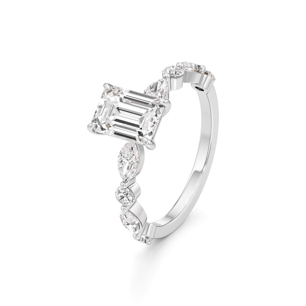 Emerald Cut & Pear Side Stone Ring