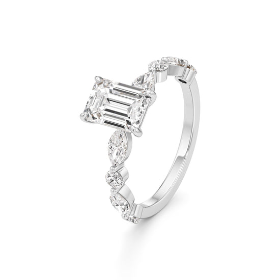 Emerald Cut & Pear Side Stone Ring