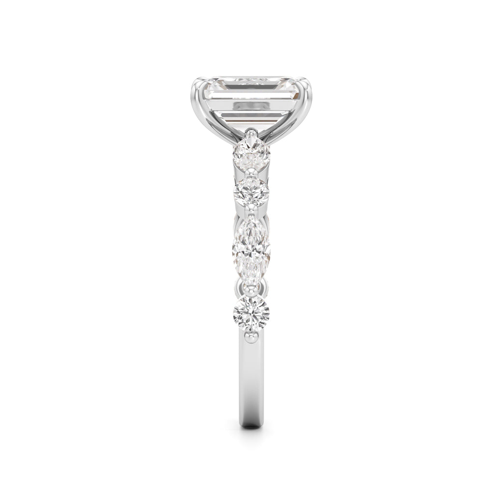 Emerald Cut & Pear Side Stone Ring