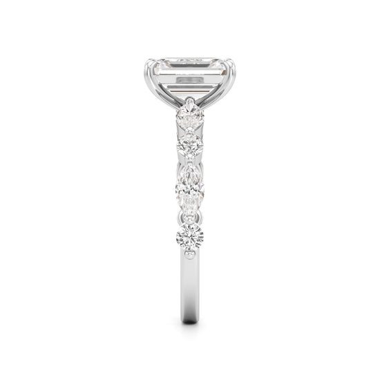 Emerald Cut & Pear Side Stone Ring